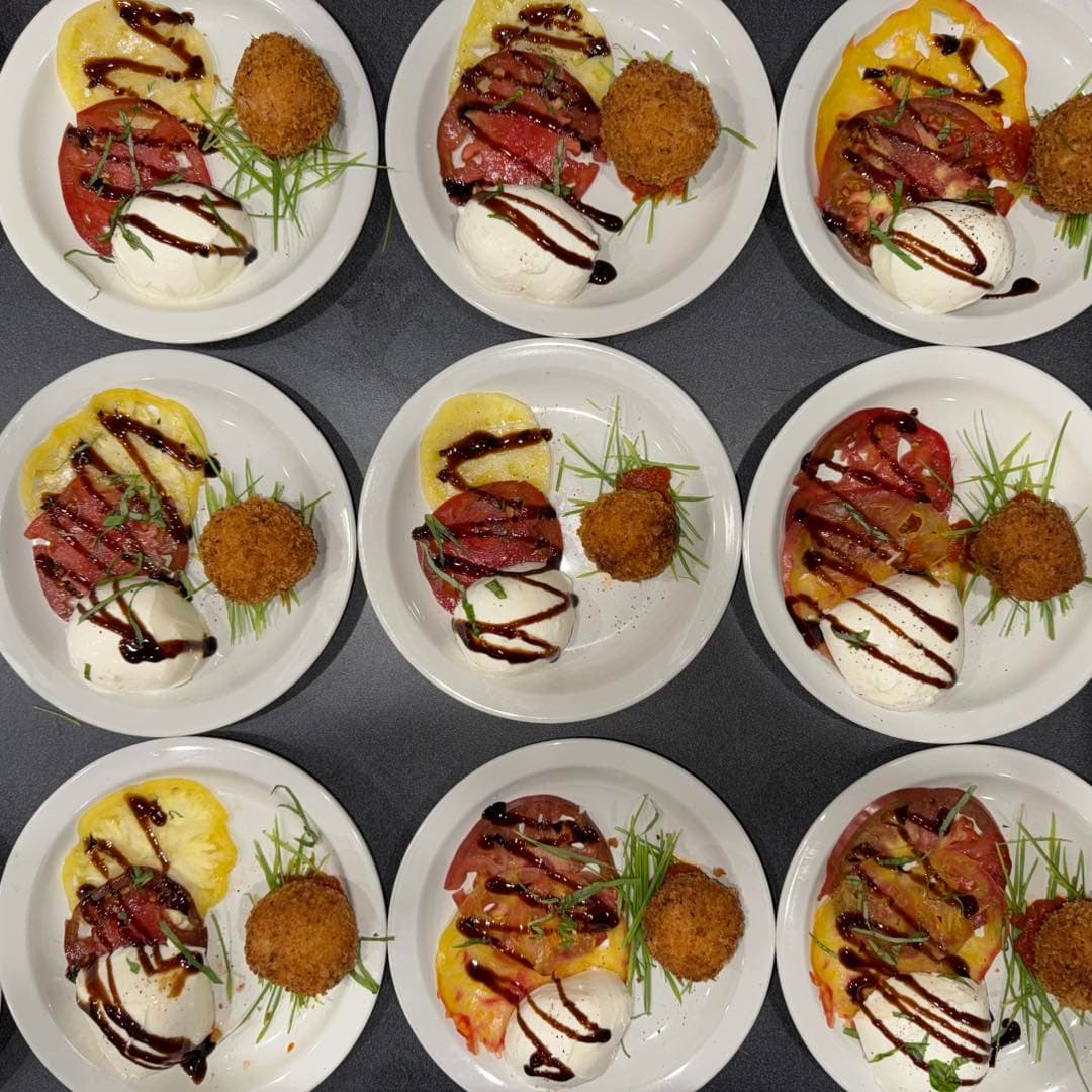 Elegant appetizers arranged for polished catered event service.