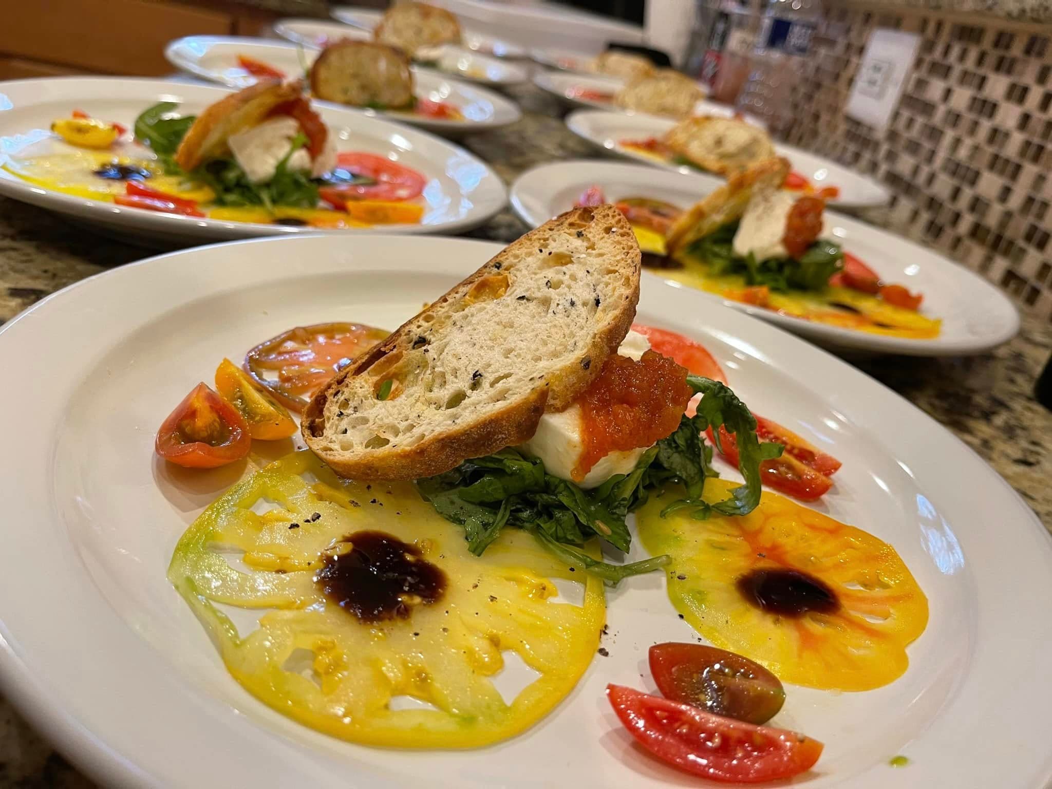 Plated entree prepared for chef-led private event service.